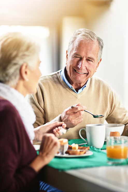 all-happiness-depends-leisurely-breakfast-shot-happy-senior-couple-enjoying-breakfast-together-home